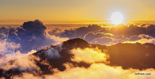 Clouds at sunrise over Haleakala Crater, Maui, Hawaii, USA