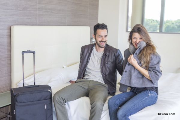 Young Couple Relaxing at Hotel Room